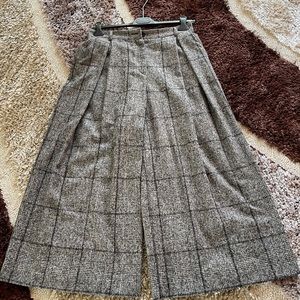 Authentic women’s Dolce Gabbana tweed dress pants for sale.